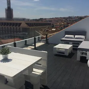 A Terrace On A Topfloor With A View Lissabon